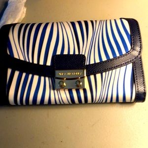 NWT VeraBradley wristlet,leather trim. Blue/White stripes,front closure,zippered